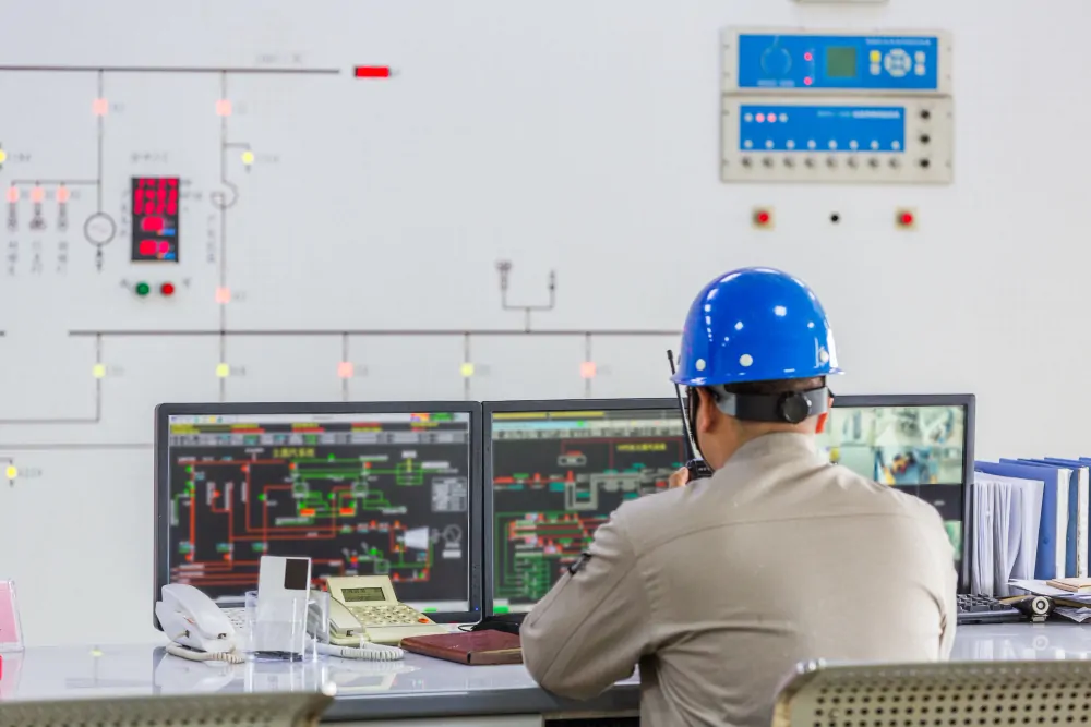 Field engineer using a data analyzer for RAPIX lighting programming and network diagnostics.